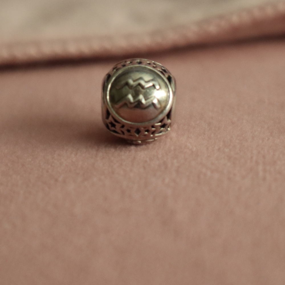 Authentic Pandora Aquarius charm